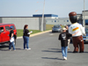 The Power Man helps the activists with handbilling